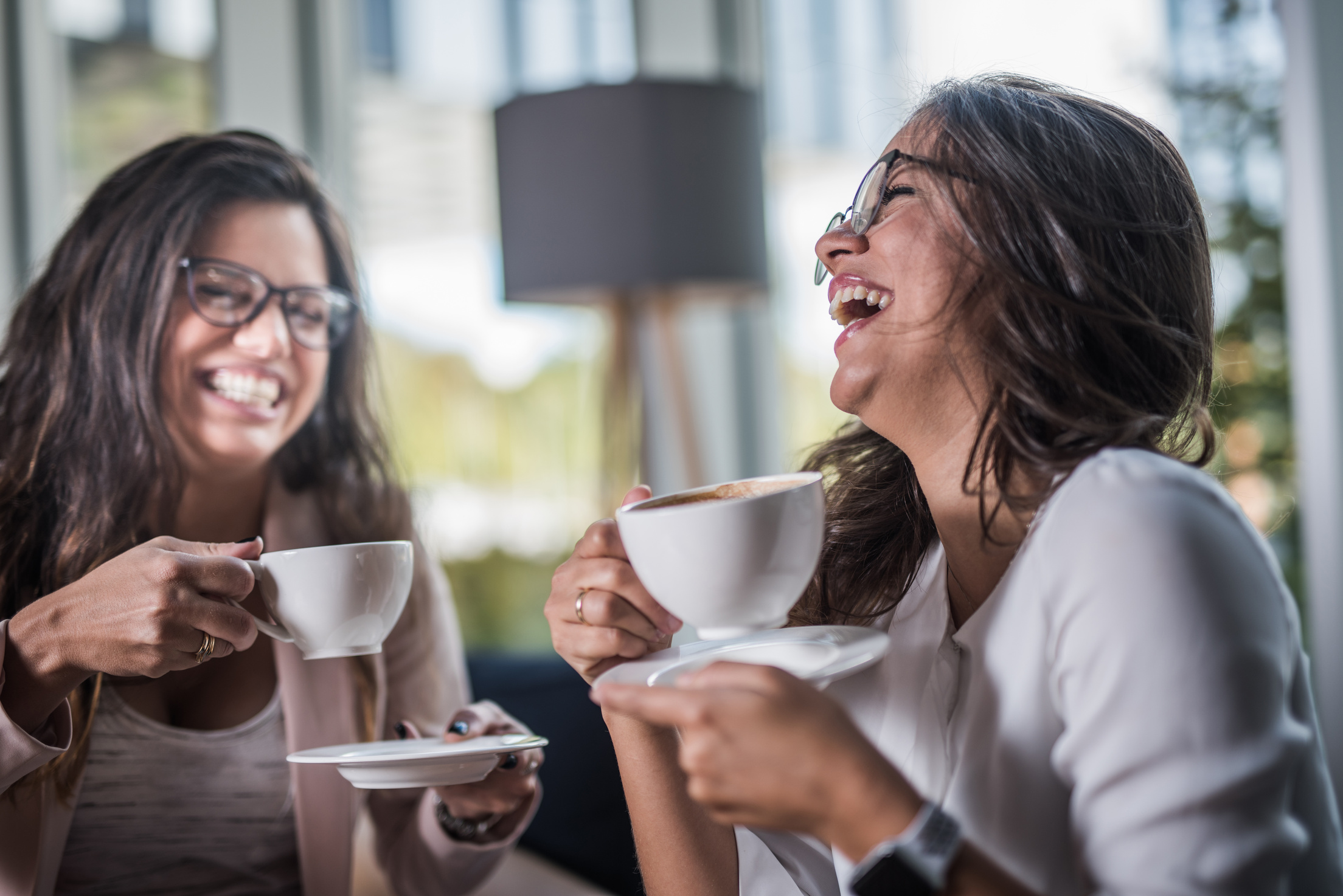 Beautiful women having coffee break.